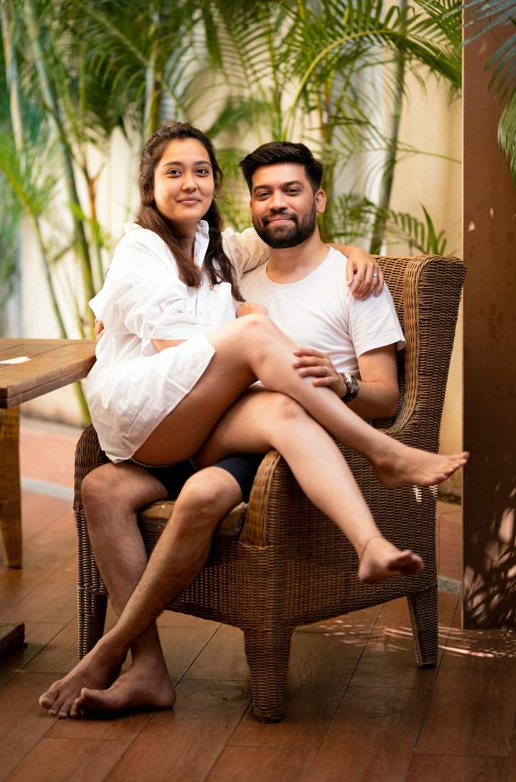 Candid couple portrait, seated