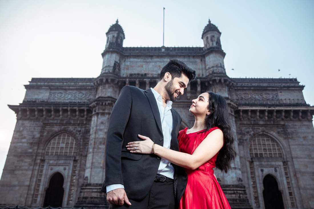 Couple in red at the Gateway of India