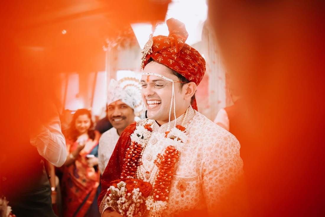 Groom in a traditional turban, candid portrait