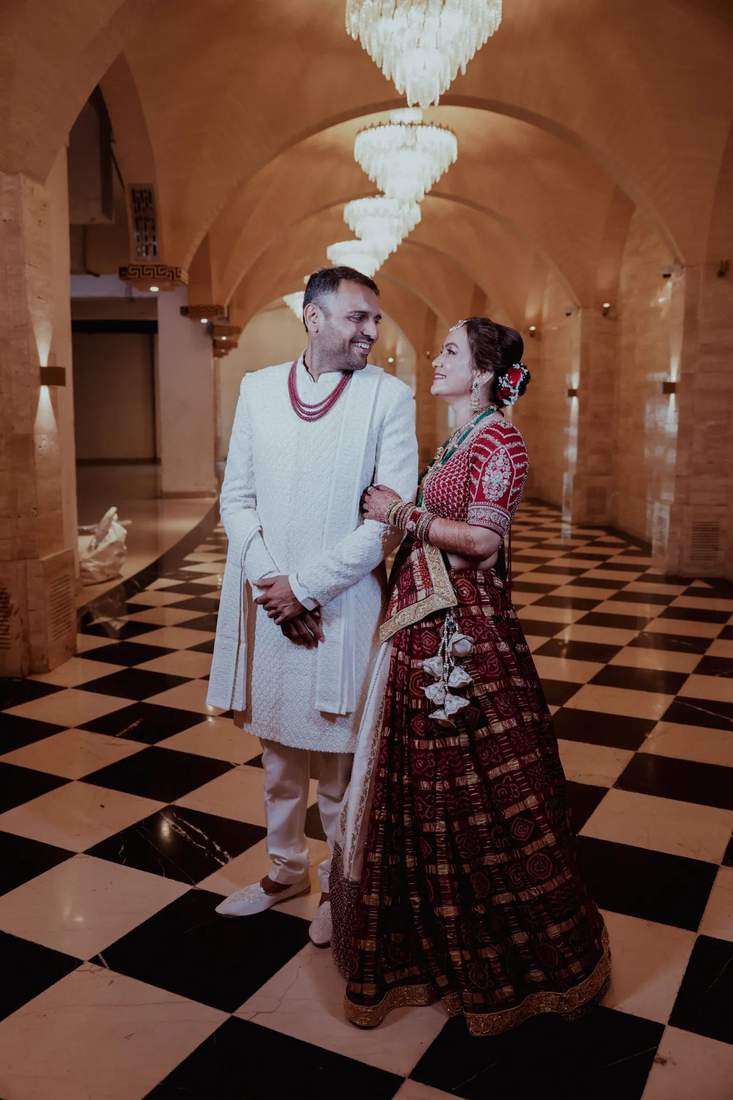 Bride and groom portrait in a marble hall