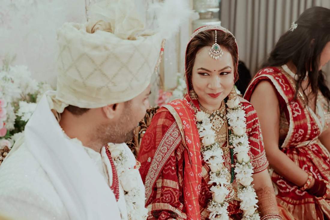 Bride and groom sharing a playful moment